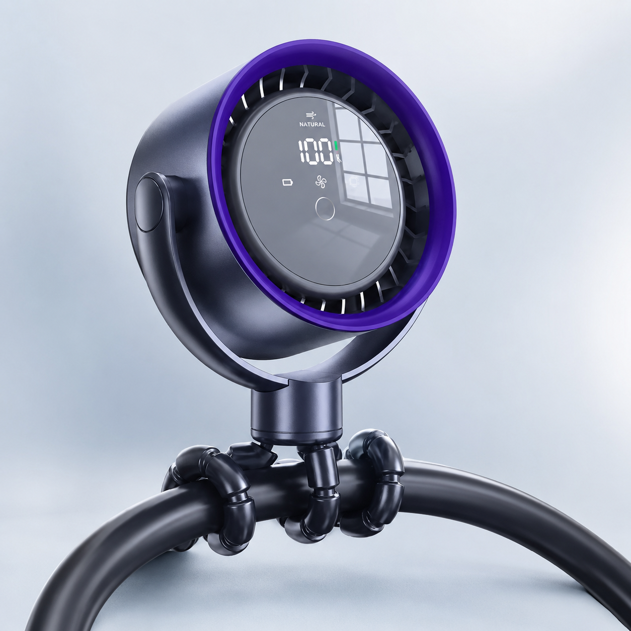 Dark gray CapyBreeze pram fan with a purple rim, LED touch display showing "100%" and "NATURAL", mounted on a flexible black tripod.