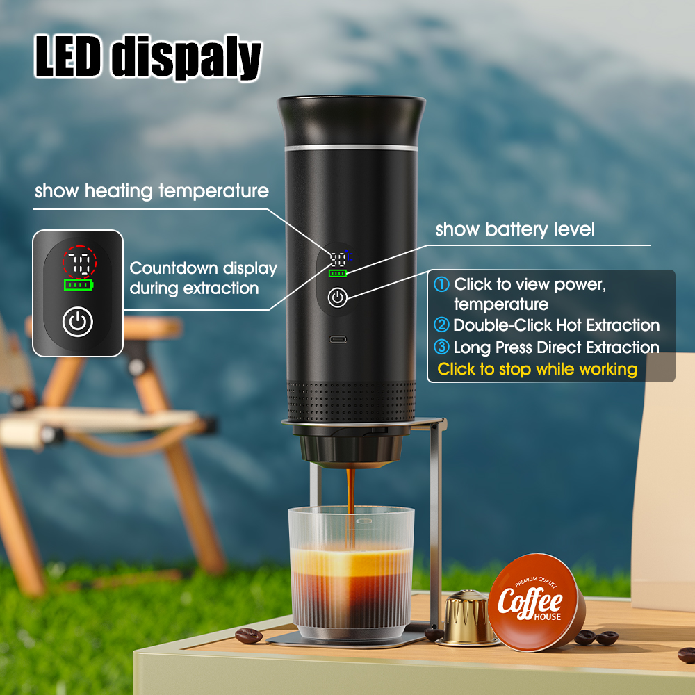 Black CapyPress 3-in-1 portable coffee machine brewing espresso into a glass, showing LED display and controls.