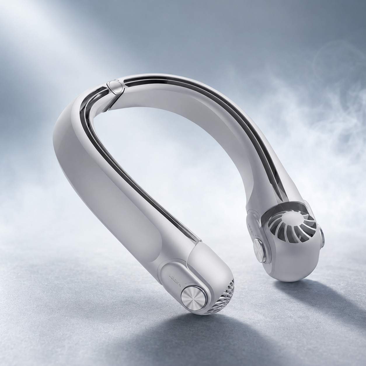 Sleek white directional rotor neck fan with adjustable vents and silver controls, shown on a grey surface.